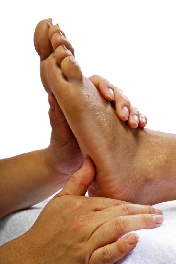 Young African American Woman Getting a Foot Massage